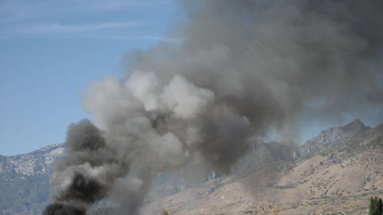 Fire marshal investigating garbage truck fires