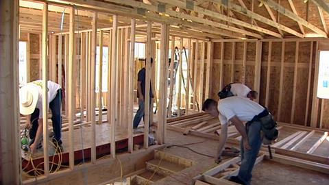 Crews build first Habitat home in Springville