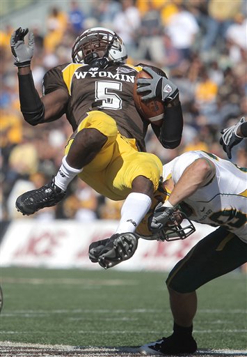 (AP Photo/Laramie Boomerang, Ben Woloszyn)