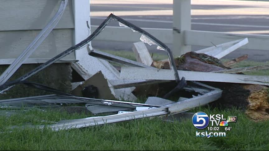 Truck slams into apartment building