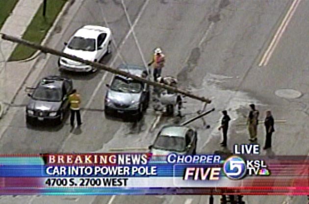 Live Power Pole Falls Onto Car