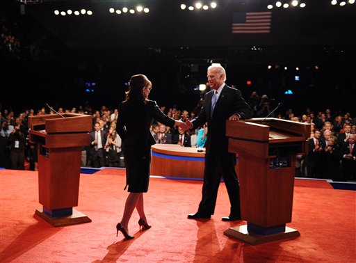 Republican vice presidential candidate, Alaska Gov. Sarah Palin, left, shakes hands with Democratic vice presidential candidate, Sen Joe Biden, D-Del., after their vice presidential debate Thursday, Oct. 2, 2008 in St. Louis, Mo. (AP Photo/Don Emmert, Pool)