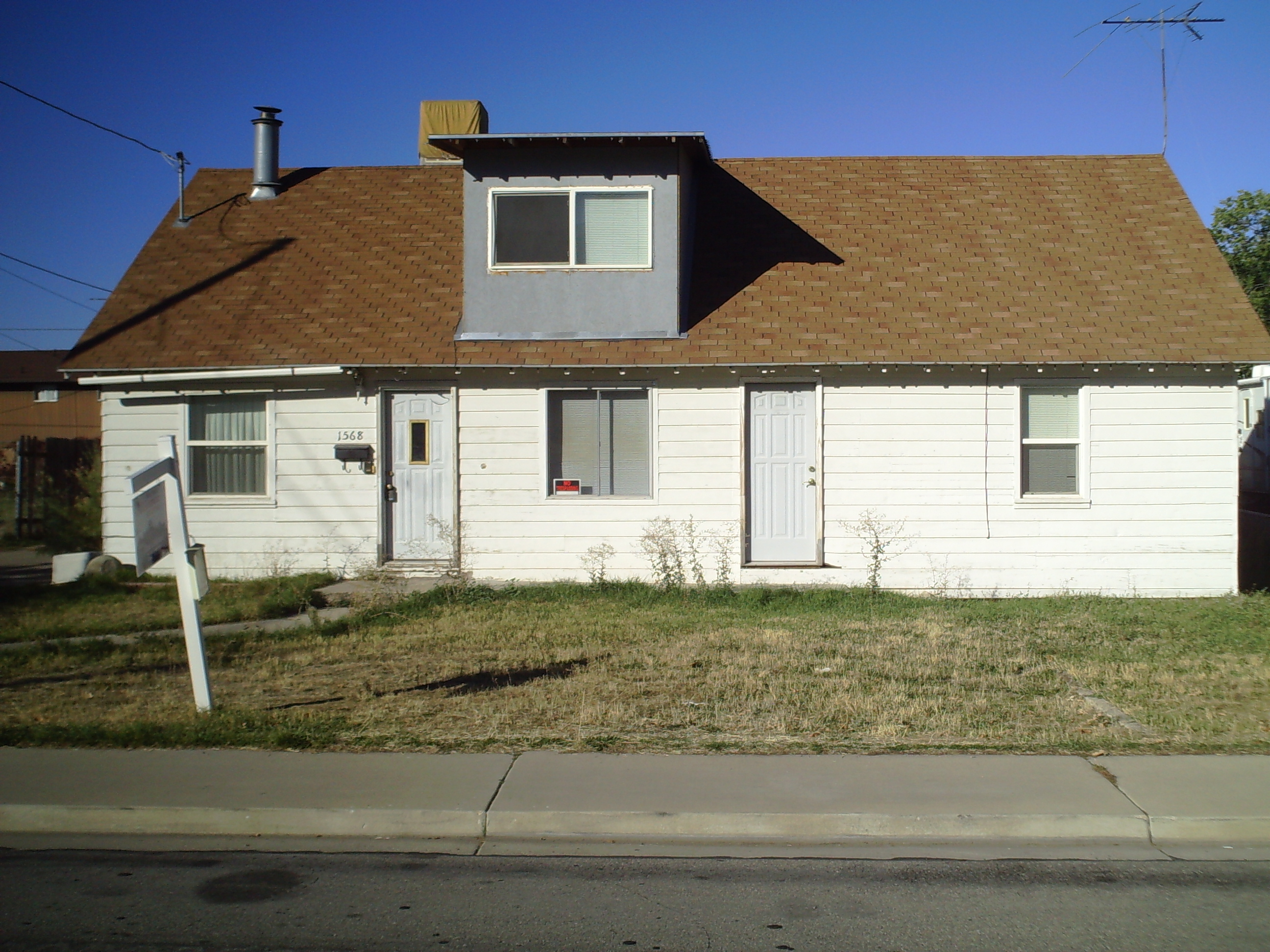 Foreclosure at home famous for brown lawn
