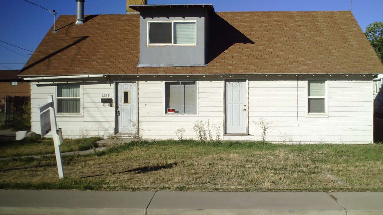 Foreclosure at home famous for brown lawn