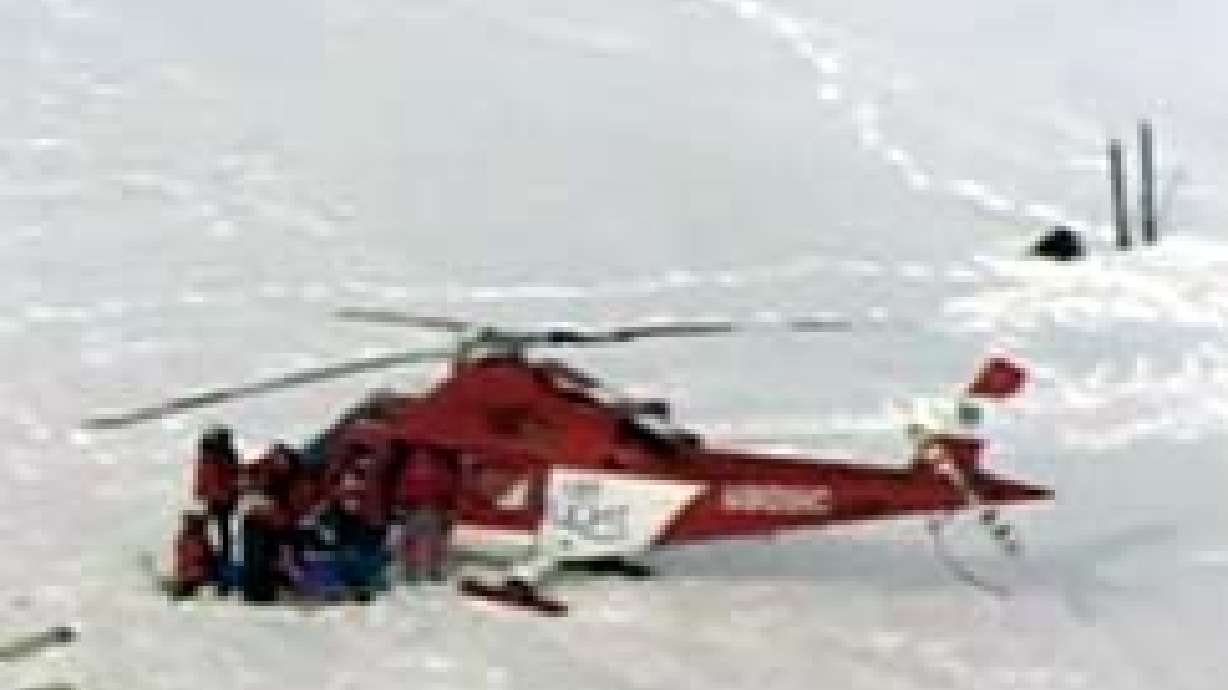 Crews Rescue Skiers Hit by Avalanche