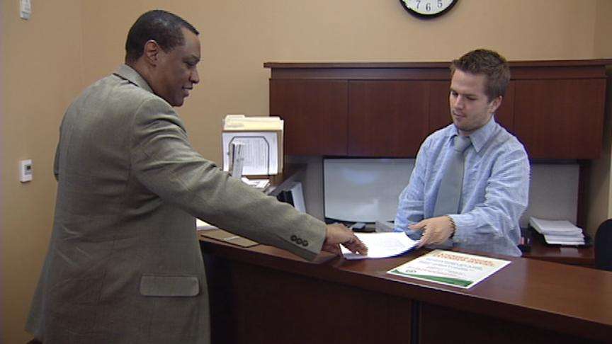 James Evans turns in accusations against Lisa Johnson to the Lieutenant Governor's Office.
