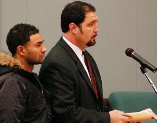 Bryant Eteuati appears in court with his lawyer.