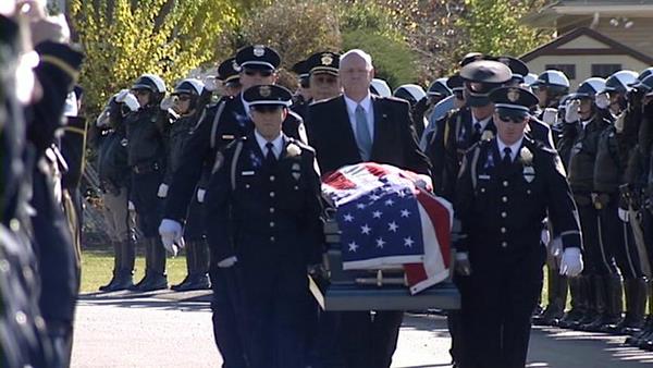 Police officer honored at funeral