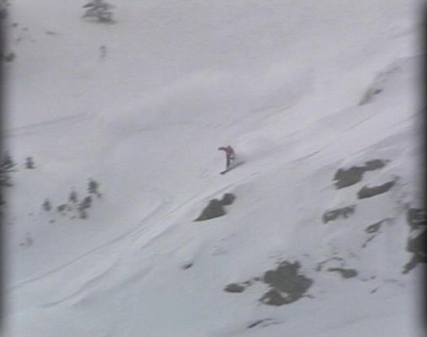 Snowboarder Triggers Avalanche and Survives the Ride