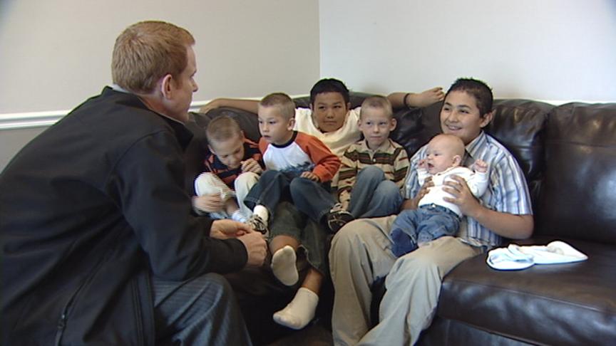 KSL's Jed Boal talks with Minnick kids.