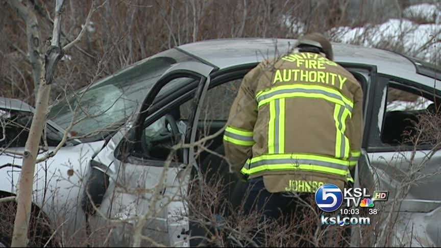SUV crashes down embankment in canyon