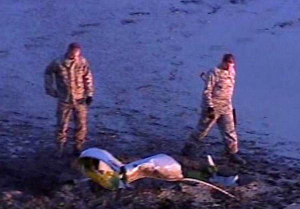 F-16 releases fuel tanks into Great Salt Lake
