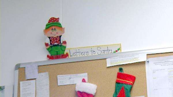 Post office employee spends 12 years helping Santa with letters