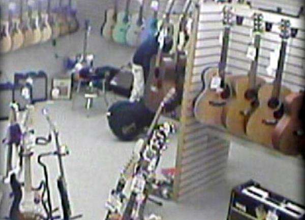 Music store employees catch guitar thief