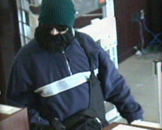 Serial robber with fake beard continues to elude police