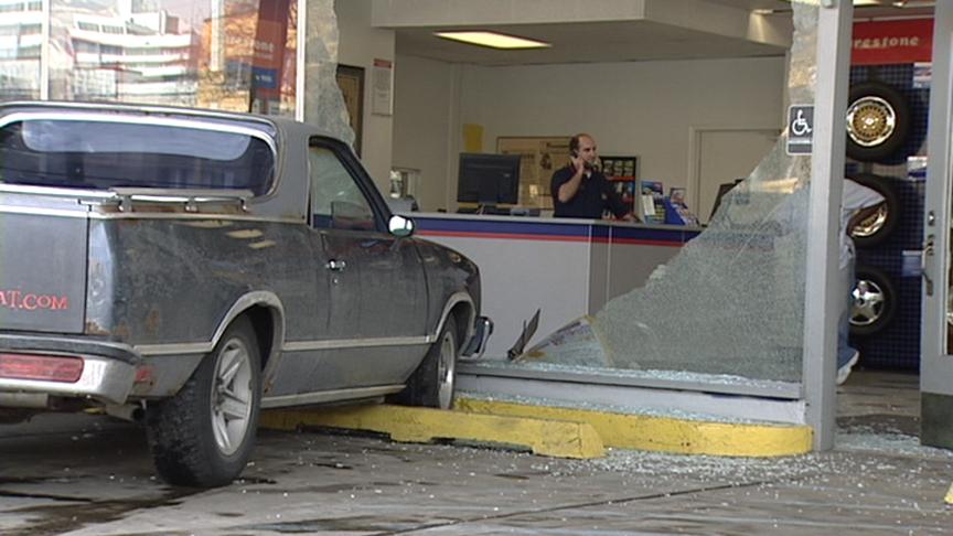 Car with Bad Brakes Crashes Into Mechanic's Store Window 