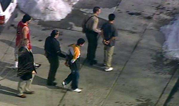 Suspects being arrested following Kearns shooting