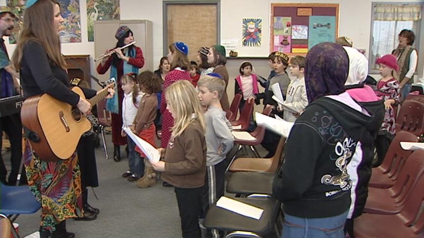 Children sing of bringing peace to the world