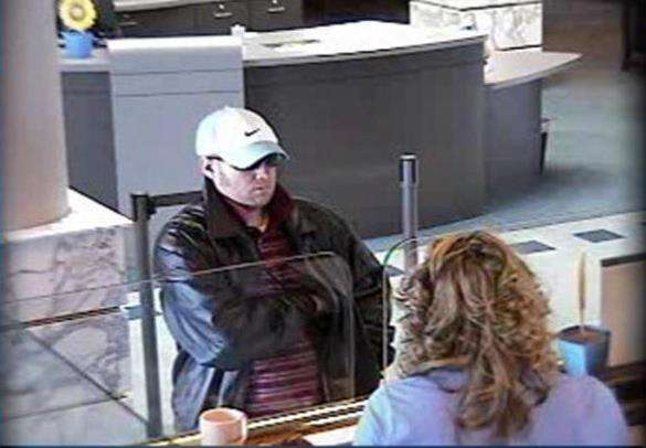 Surveillance photo from previous robbery on March 8th.