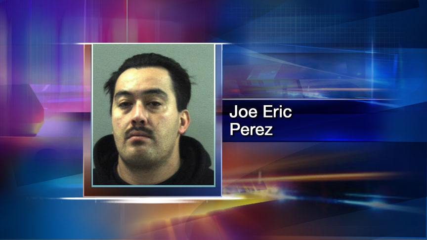 Man arrested after threatening officer with cell phone
