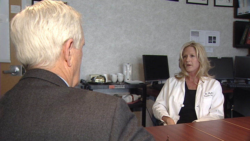 Dr. Michelle Mueller talking with KSL's Ed Yeates