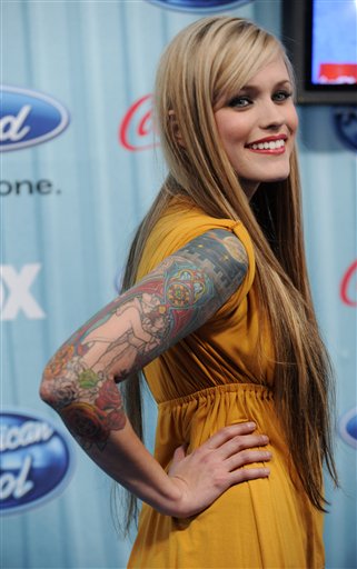"American Idol" finalist Megan Corkrey of Sandy, Utah poses at the American Idol Top 13 Party in Los Angeles, Thursday, March 5, 2009. (AP Photo/Chris Pizzello)